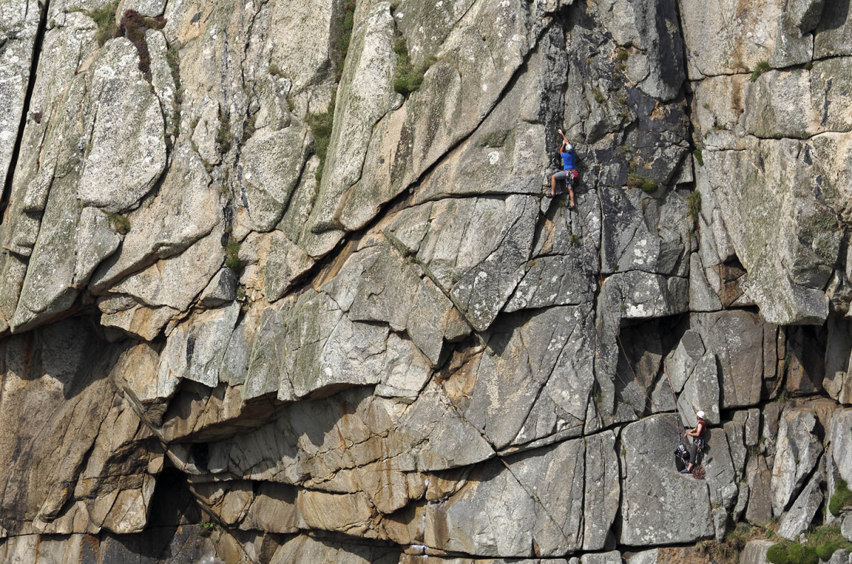 Climbers on the super-classic Doorpost (HS) on the main cliff at Bosigran. Photo: © David Simmonite