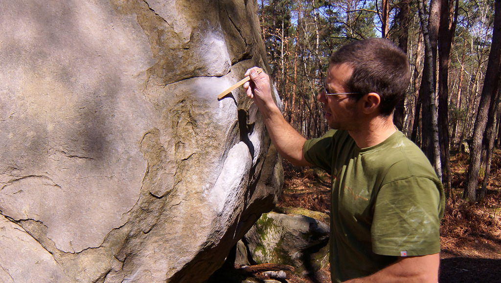 Brushing away excessive chalk and tick marks can also improve the friction of the holds.