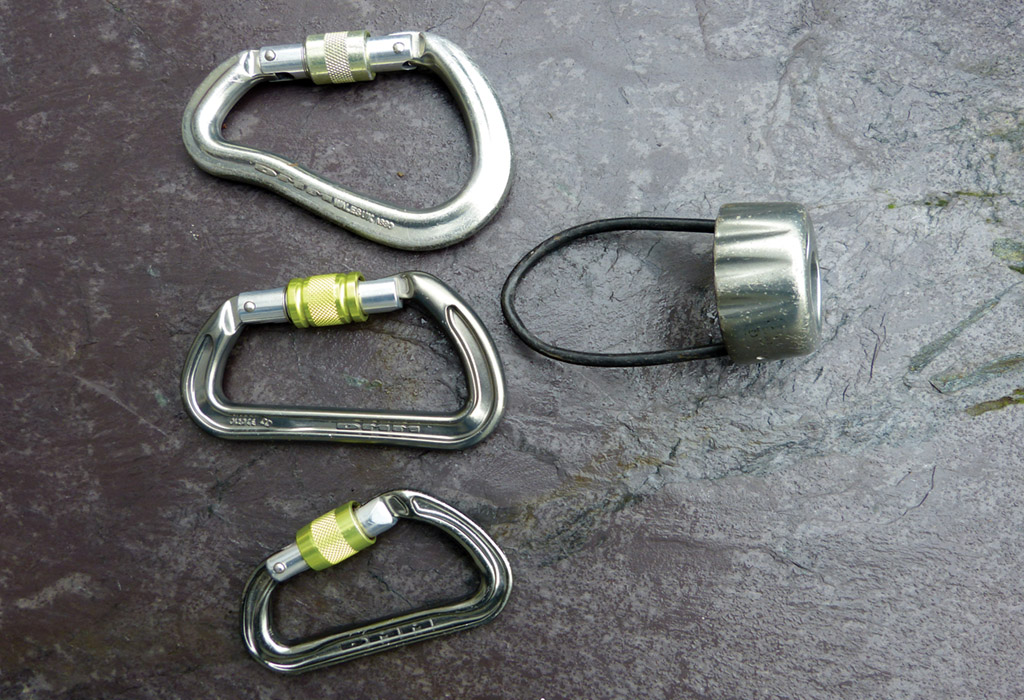 A belay device can be paired with either a large diameter rod HMS type screwgate or smaller I-beam construction krabs. Photo: Graham Desroy