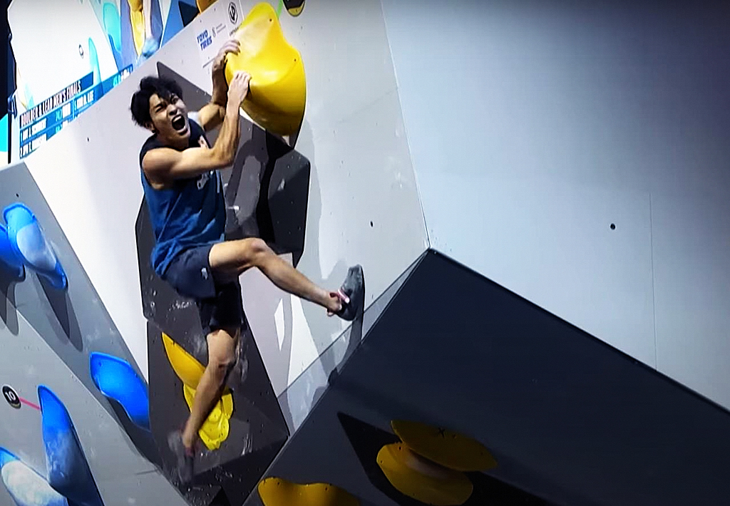 Tomoa Narasaki flashing M3 to take the narrowest of leads at the end of a closely contested, high scoring Boulder round. Video Grab