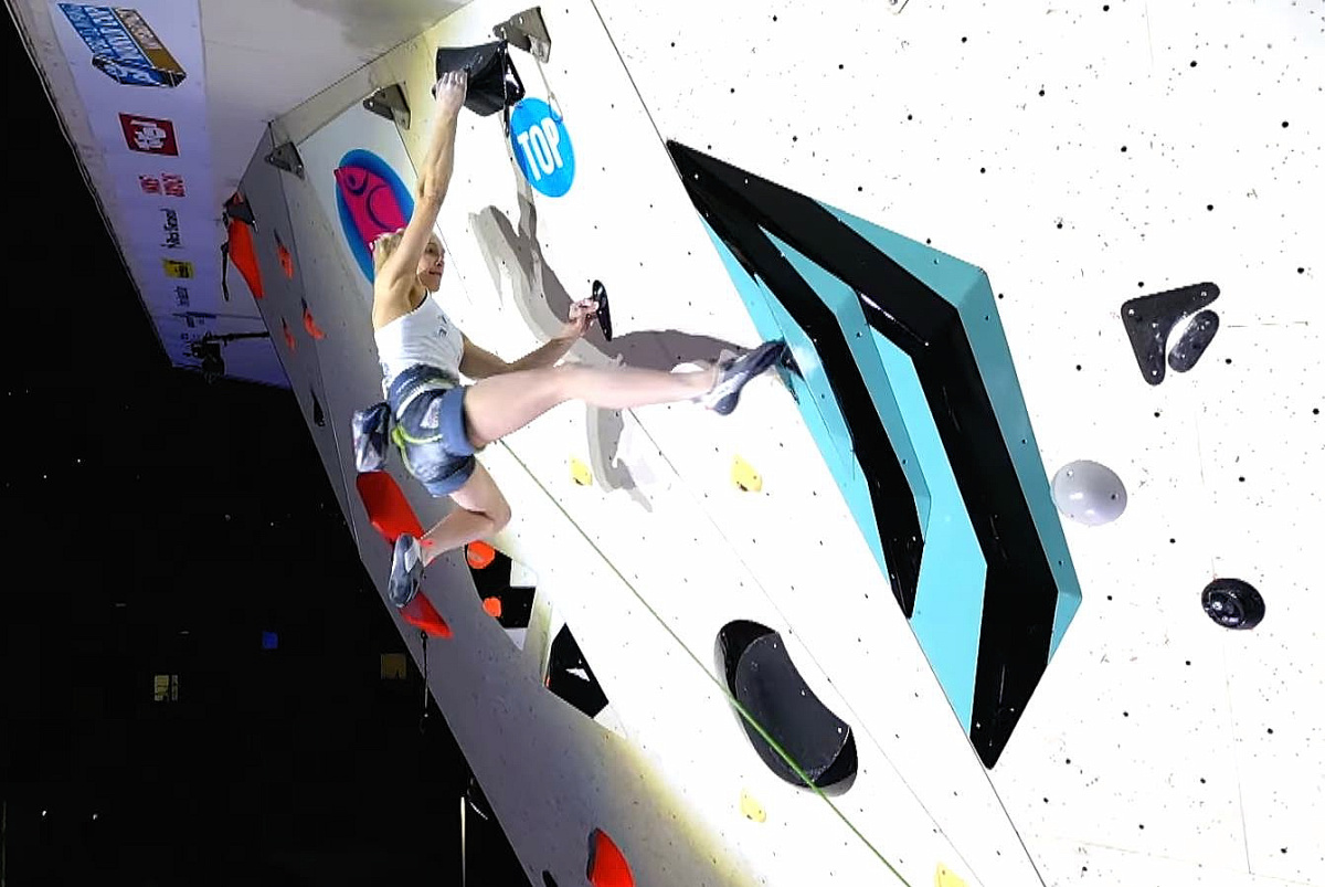 Janja Garnbret collecting her second Gold from the Innsbruck event; surely she must be odd-on to take the Gold and defend her Olympic Title?! Videograb: IFSC