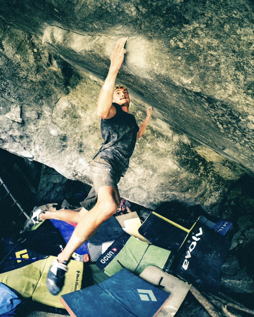 Jules Marchaland successfully flashing Power of Now Direct (Font 8C) at Magic Wood, Switzerland. Photo: Timothée Nitschke