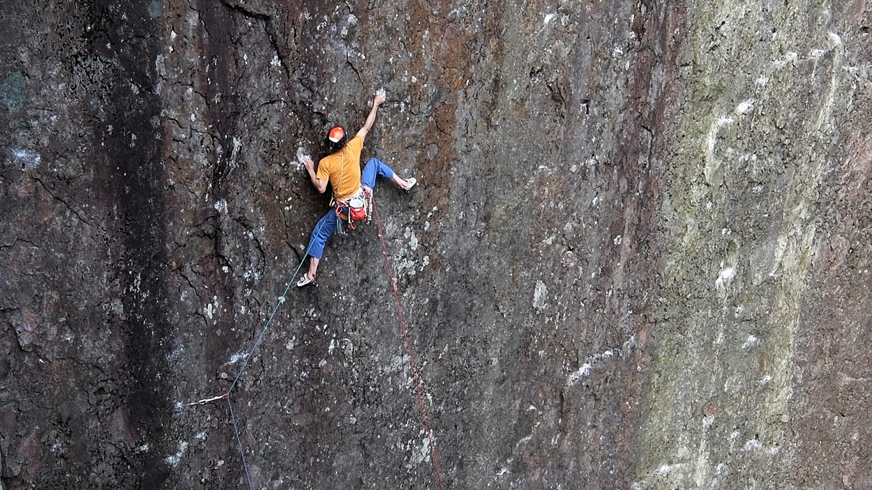 Steve on the crucial run-out headwall of Nightmayer: “Before setting off I’d drawn an imaginary line on the wall, below which a fall ‘should’ be saved by the gear on the girdle ledge. The ‘crucial’ wire went in, but didn’t look brilliant, and there was NO way I could risk my life to just that little thing, so I had to stay absolutely focussed on my imaginary line…. Though as I climbed, and the run-out increased, I was doubting my maths!”. Photo: Keith Sharples