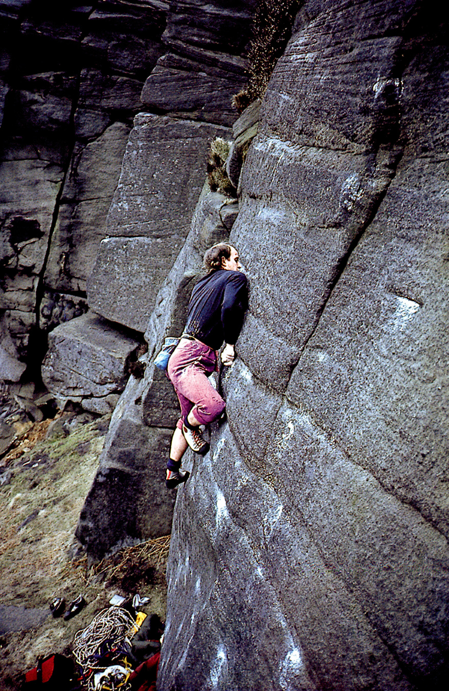 The Boss, John Allen climbing  Shirley’s Shining Temple (E5 7a), Stanage in March 1984 during his second wave of gritstone development. Photo: © Paul Williams.