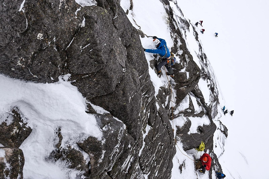 Host climber Luca Celano and Carl Nystedt from Sweden climbing Pot of Gold (V,6),Coire an t-Sneachda. Cairngorms. Photo: Marc Langley