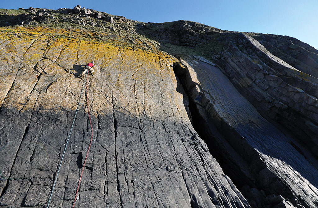 Beautiful slab climbing, Rob Stanfield on the crux of Pippin Direct (VS), Hurlstone Point. Photo: © Mark Davies