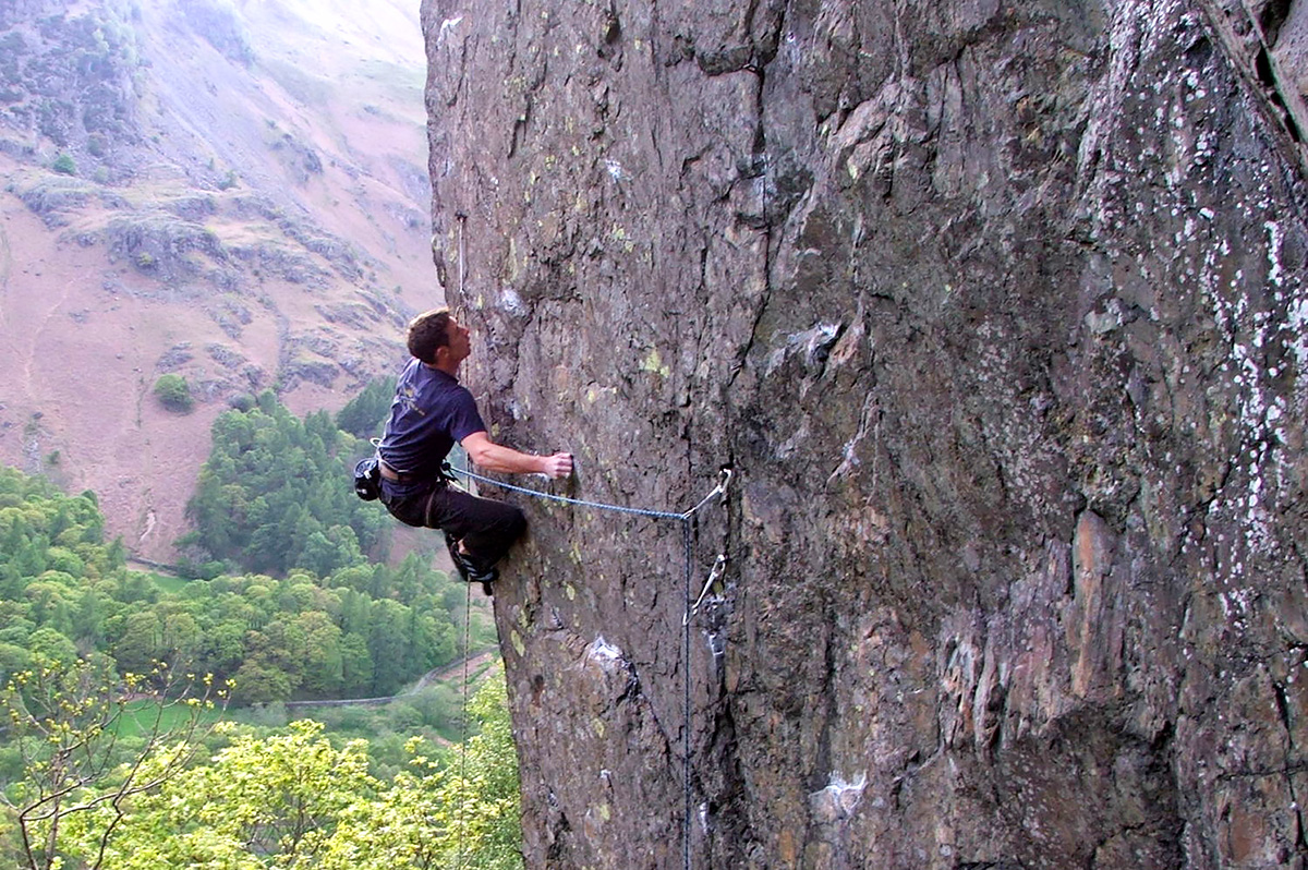 Wes Hunter climbing Inferno (E7 6c), Bowderstone Crag. Photo: © Wes Hunter