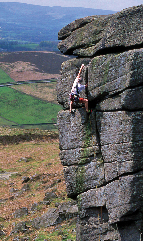 Stephen Coughlan climbing The File (VS 4c), Higgar Tor, Peak District. Photo: David Simmonite