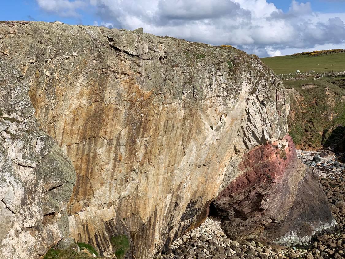 The impressive overhanging 30m high wall at Porth Saint. Photo: Mick Lovatt